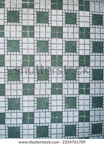 This is a green and white ceramic suitable for wallpaper