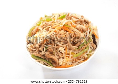 Chicken Singapore noodles. Is a popular Chinese-Japanese delicacy all over Japanese. Arabic, Chinese cuisine pictures, isolated on White background.