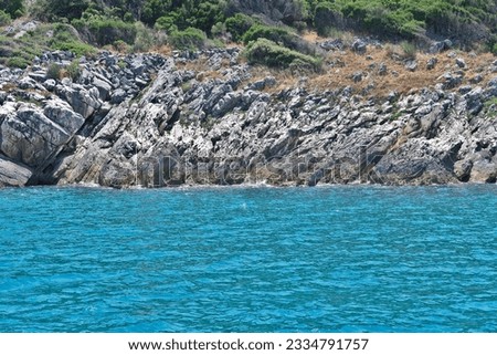 Photo of clear tirquaz waters in northen Corfu, Greece