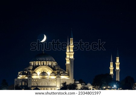 Islamic photo. Suleymaniye Mosque and crescent moon. Ramadan or islamic background photo. Royalty-Free Stock Photo #2334801597