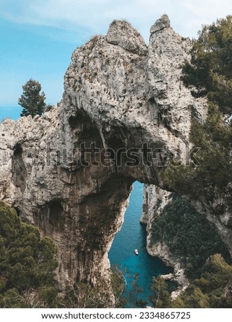 Natural Arch - rock formation in Capri Royalty-Free Stock Photo #2334865725