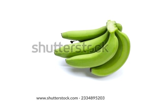 Raw banana isolated on white background. Royalty-Free Stock Photo #2334895203