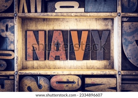 The word -Navy- written in vintage wooden letterpress type.