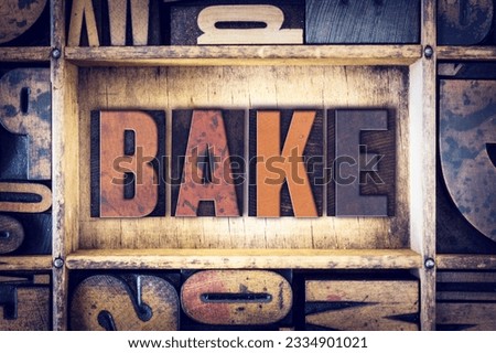 The word -Bake- written in vintage wooden letterpress type.