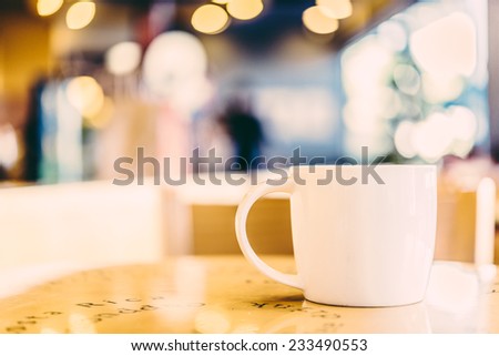Coffee cup in coffee shop - vintage effect style pictures