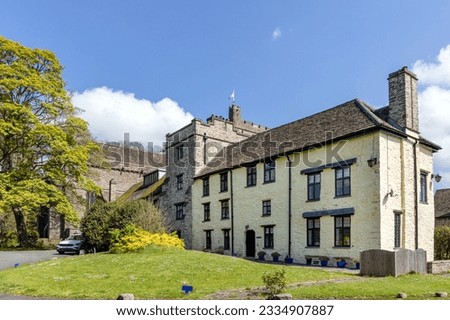 St John's Deanery in Brecon Cathedral was once a part of the Priory's western cloister and is now connected to the main cathedral by the vestries and choir room. Royalty-Free Stock Photo #2334907887