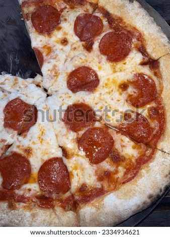 Pepperoni pizza with mozzarella cheese