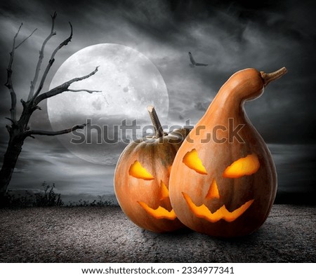 Angry pumpkins under fool moon. Elements of this image furnished by NASA