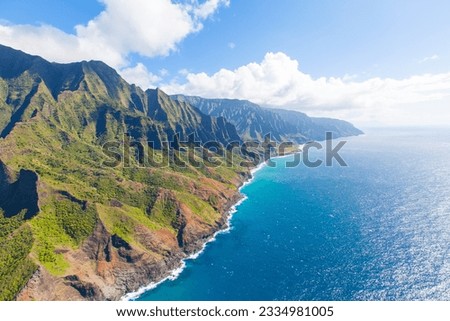view of beautiful na pali coast at kauai island, hawaii from helicopter Royalty-Free Stock Photo #2334981005