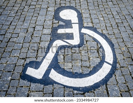 typical disabled sign at a street - photo