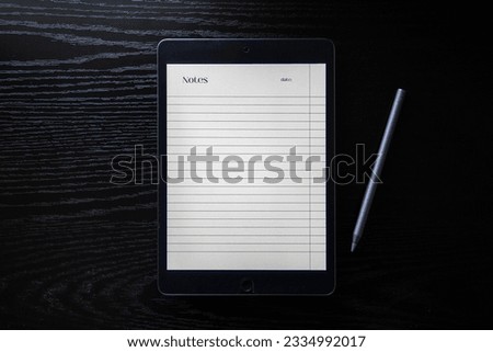 Notepad opened on the tablet, black background
