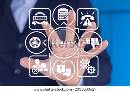Man using virtual touch screen sees word: COMPLAINT. Concept of business complaints. Customer complaint, dissatisfaction from product or service problem, angry feedback from client. Royalty-Free Stock Photo #2335000629
