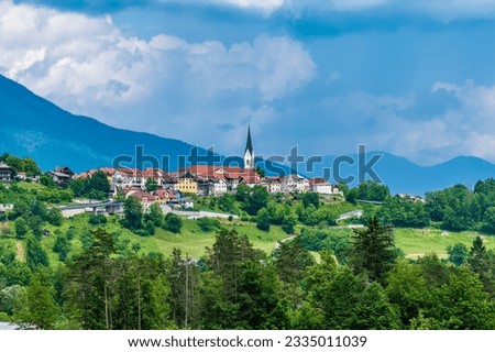 A view towards the hilltop town of Radovljica, Slovenia in summertime Royalty-Free Stock Photo #2335011039