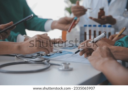 Cropped image of successful medical doctors discussing diagnosis during the conference