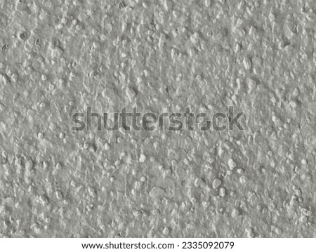 Pattern of grains of sand mixed with cement on the wall.