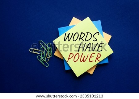 Words have power symbol. Yellow steaky note with words Words have power. Beautiful deep blue background. Business and Words have power concept. Copy space. Conceptual word