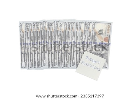 Money budget planning note with Dollars isolated on white background, financial goal concept. 