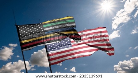 Thin Line First Responder American Flag Thin Line First Responder flag waving at cloudy sky background on sunset, panoramic view. copy space for wide banner. Royalty-Free Stock Photo #2335139691