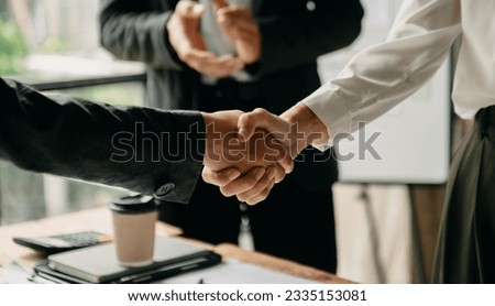 business people shaking hands during a meeting in office
 Royalty-Free Stock Photo #2335153081