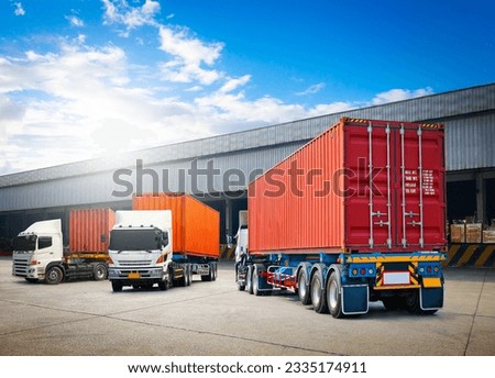 Semi Trailer Trucks on The Parking Lot. Trucks Loading at Dock Warehouse. Shipping Cargo Container Delivery Trucks. Distribution Warehouse. Freight Trucks Cargo Transport. Warehouse Logistic. Royalty-Free Stock Photo #2335174911
