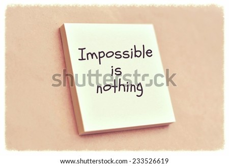 Text impossible is nothing on the short note texture background