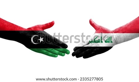 Handshake between Iraq and Libya flags painted on hands, isolated transparent image.