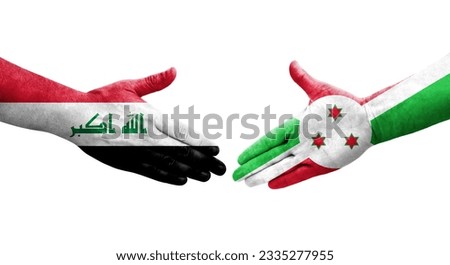 Handshake between Burundi and Iraq flags painted on hands, isolated transparent image.