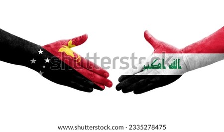 Handshake between Iraq and Papua New Guinea flags painted on hands, isolated transparent image.
