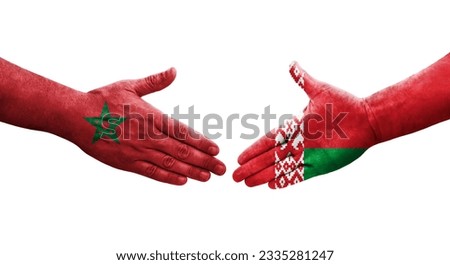 Handshake between Belarus and Morocco flags painted on hands, isolated transparent image.