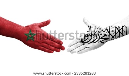 Handshake between Afghanistan and Morocco flags painted on hands, isolated transparent image.