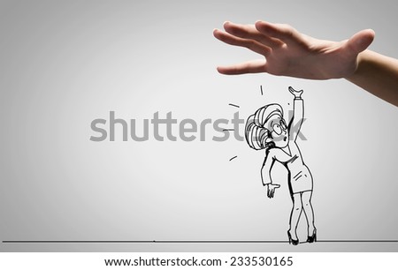 Close up of human hand catching running away businesswoman