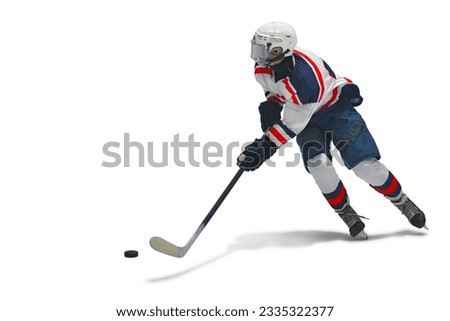 Ice Hockey player skating run fast with hockey stick isolated on white background. This has clipping path.