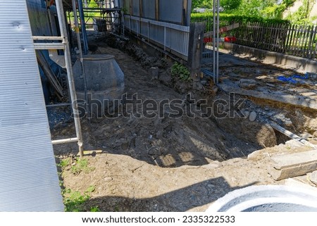 Ditch with water pipes at apartment building construction site at Swiss City of Zürich district Schwamendingen. Photo taken July 20th, 2023, Zurich, Switzerland.