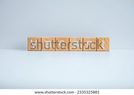 Wooden blocks form the text "Vacant" against a white background.