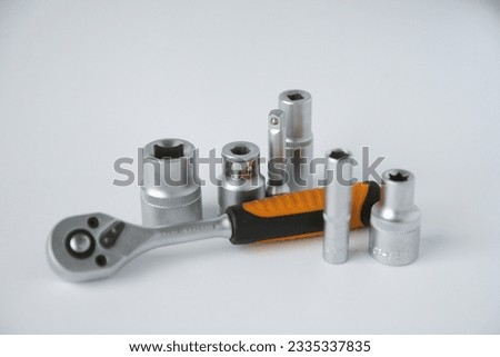 a set of hand tools on a white background