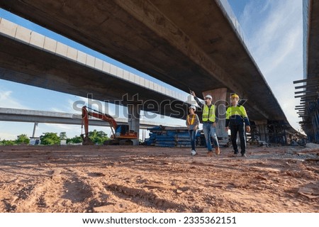 Asian engineers inspect expressway construction Asian architects and mature supervisors meeting at expressway construction site Royalty-Free Stock Photo #2335362151