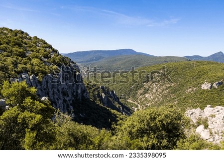 City of Ganges, at the southern entrance to the Cevennes, from the Combe Chaude Regional Nature Reserve Royalty-Free Stock Photo #2335398095