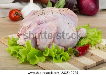 Raw Quail with herbs ready for cooking