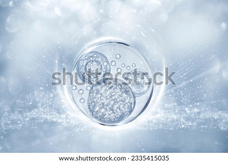 bubble serum on bokeh background Royalty-Free Stock Photo #2335415035