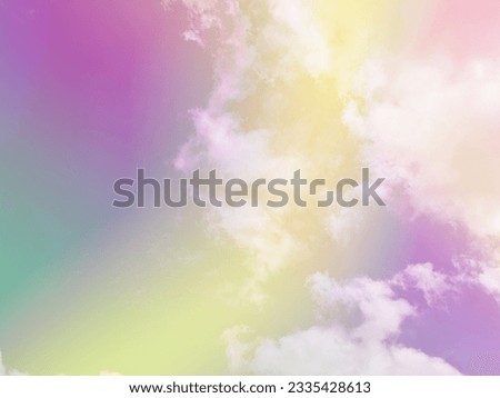 beauty abstract sweet pastel soft purple and yellow with fluffy clouds on sky. multi color rainbow image. fantasy growing light