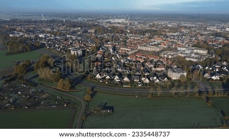 Aerial drone photo of the houses and buildings in the small (European) Dutch city Steenwijk in Overijssel, The Netherlands. 