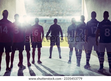Silhouette of soccer teams facing field Royalty-Free Stock Photo #2335453779