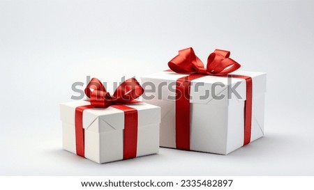 White gift box with red ribbon, blank white background for design Royalty-Free Stock Photo #2335482897