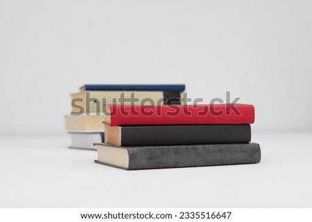 stack of different books on white background. space for text