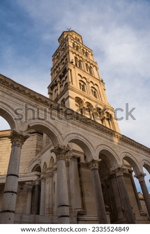 The Romanesque bell tower of the Cathedral of Saint Domnius - Katedrala Svetog Duje - in Split, Croatia. Located within the Diocletian Palace. Seen from Peristil  Royalty-Free Stock Photo #2335524849