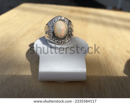 white opal ring.It is a powerful stone that allows users to access those niches and cubbyholes where love, passion, and lust reside