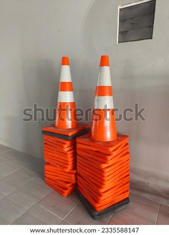 The orange cone used to stop the car was kept in order.