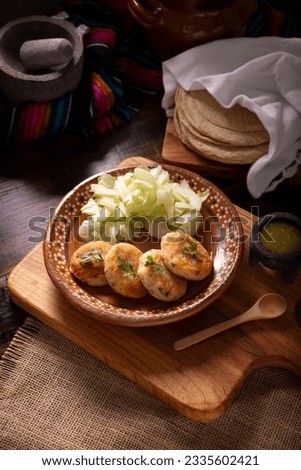 Potato pancakes, a very popular homemade dish in many countries, in traditional Mexican cuisine they are known as "Tortitas de Papa", it is an easy, fast and economical recipe. Royalty-Free Stock Photo #2335602421