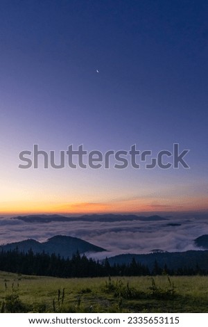 landscape in the mountains, sunset, sunrise, silhouettes of peaks, Montenegrin mountain range, Carpathians, travel, screensaver, poster, poster, cover, print, spring, winter