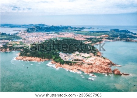 Aerial photography of Chengshantou Scenic Spot, Rongcheng City, Weihai City, the easternmost point of China's coastline Royalty-Free Stock Photo #2335657905